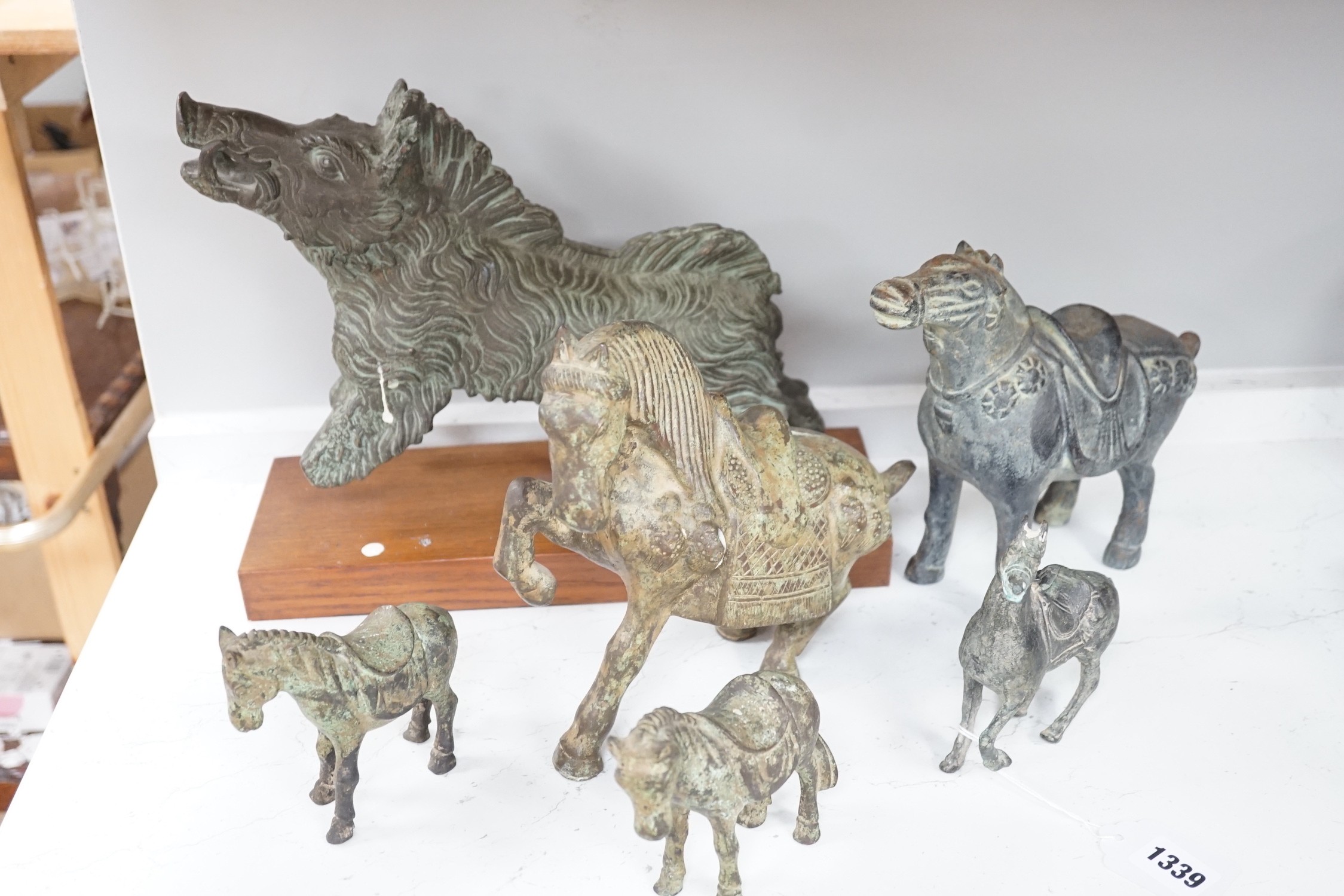 A group of reproduction bronze figures after early Chinese and other examples from antiquity, tallest 21cm